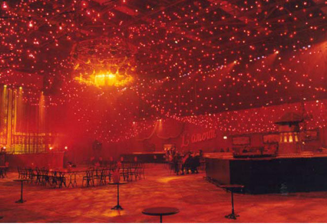 MOULIN ROUGE LAUNCH 2001. The launch of Baz Luhrmann's Moulin Rouge took place on the actual sound stage the movie was created. The riddle to create an opening – media saturated – event for 3000 people with a limited budget that powerfully recreated the flavor of the film and elicited the effect of stepping into the actual film itself.