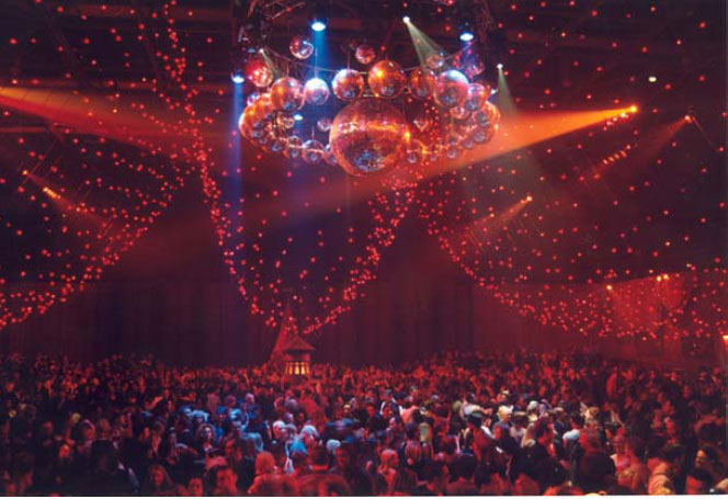 MOULIN ROUGE LAUNCH 2001. The launch of Baz Luhrmann's Moulin Rouge took place on the actual sound stage the movie was created. The riddle to create an opening – media saturated – event for 3000 people with a limited budget that powerfully recreated the flavor of the film and elicited the effect of stepping into the actual film itself.